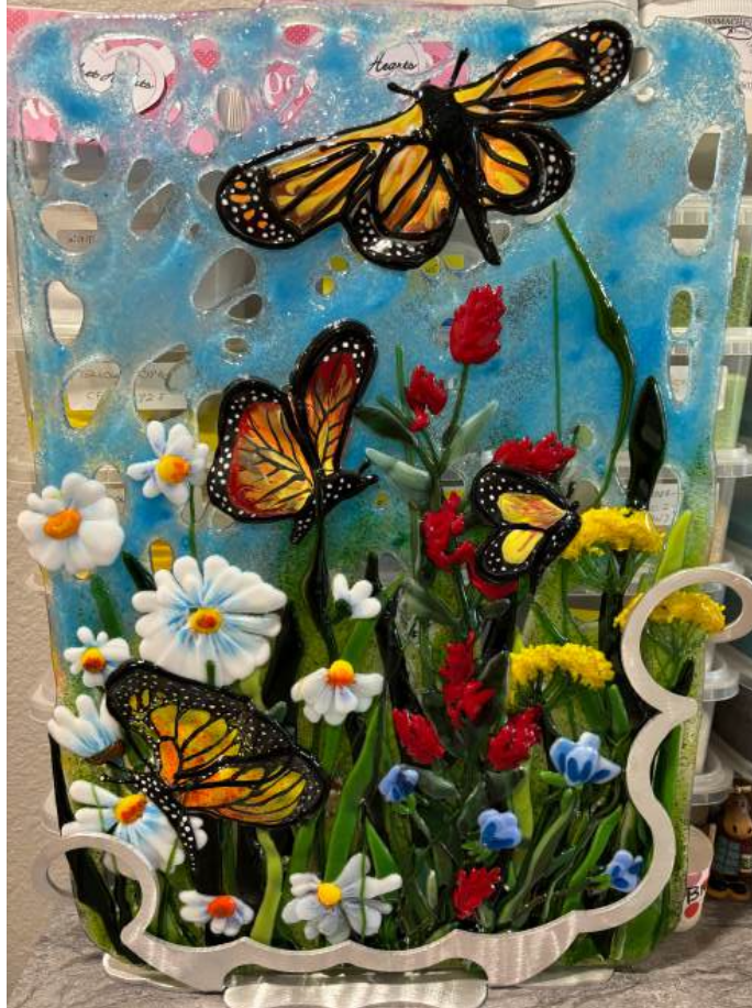 Holy Scrap Tutorial cover: a fused-glass panel of monarch butterflies over a wildflower field, built on a scrap-glass background.